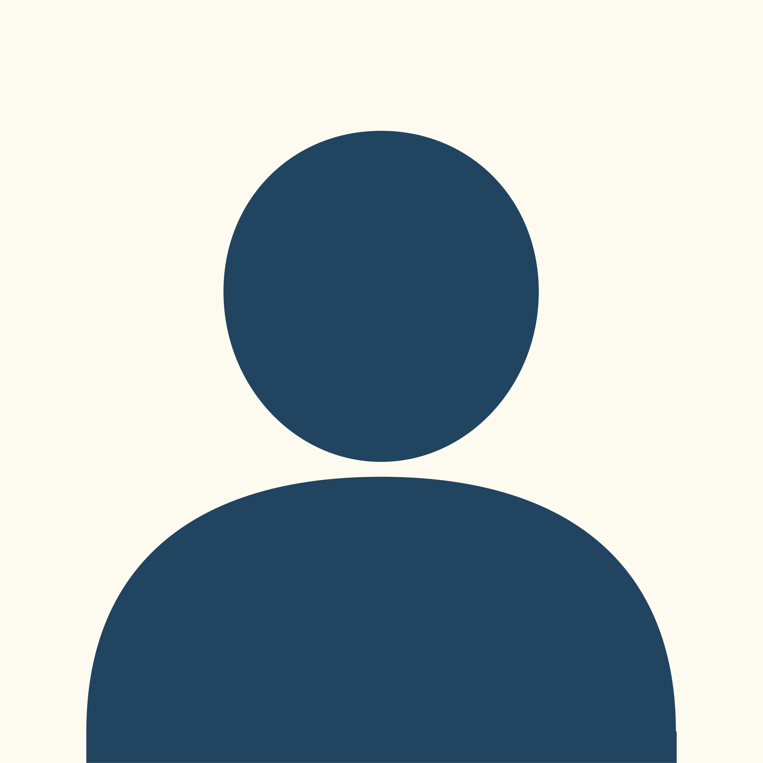 Professional headshot of a person with short layered dark hair and a streak of blonde, smiling, wearing a white shirt and black blazer, against a pale background.